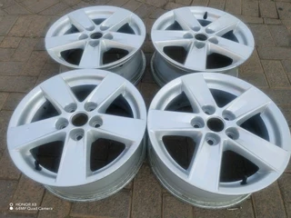 16 inch m i t s u b i s h i magrims 5 holes  Wth NO CENTRE CAPS a set of four on sale