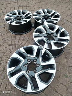 18 inch 6 holes t o y o t a h i l l u x magrims a set of four on sale