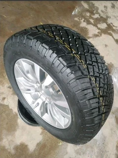 O n e 255 60 r18 g e n e r a l g r a b b e r a t &amp; 18 inch i s u z u xrider magrim on sale