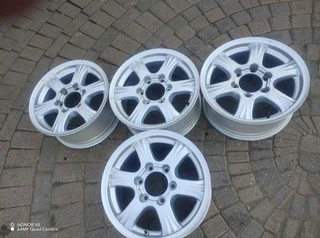 16 inch g m w magrims 6 holes w t h n o c e n t r e c a p s a set of four on sale