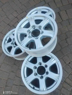 16 inch g m w magrims 6 holes w t h n o c e n t r e c a p s a set of four on sale