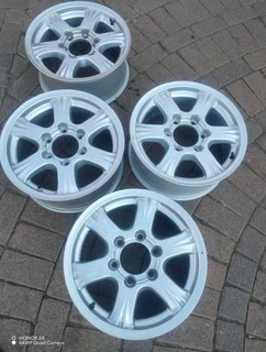 16 inch g m w magrims 6 holes w t h n o c e n t r e c a p s a set of four on sale