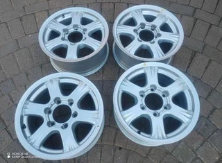 16 inch g m w magrims 6 holes w t h n o c e n t r e c a p s a set of four on sale