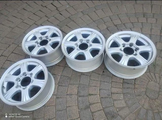 16 inch g m w magrims 6 holes w t h n o c e n t r e c a p s a set of four on sale