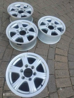 16 inch g m w magrims 6 holes w t h n o c e n t r e c a p s a set of four on sale