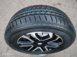O n e 18 inch f o r d magrim &amp; 265 60 r18 b r i d g e s t o n e d u e l e r tyre on sale