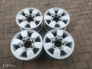 15 inch t o y o t a h i l l u x magrims 6 holes w t h n o c e n t r e c a p s a set of four on sale