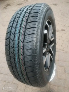 O n e 265 60 r18 b r i d g e s t o n e d u e l e r tyre &amp; 18 inch f o r d magrim on sale