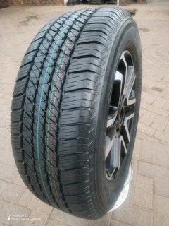 O n e 265 60 r18 b r i d g e s t o n e d u e l e r tyre &amp; 18 inch f o r d magrim on sale