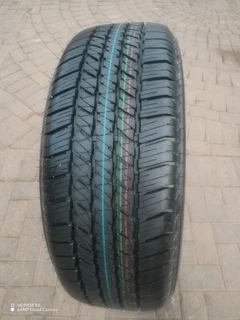O n e 265 60 r18 b r i d g e s t o n e d u e l e r tyre &amp; 18 inch f o r d magrim on sale