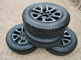 18Inch TOYOTA HILLUX Magrims 6Holes &amp; DUNLOP GRAND TREK Tyres 265 60R18 A Set Of Four On Sale.