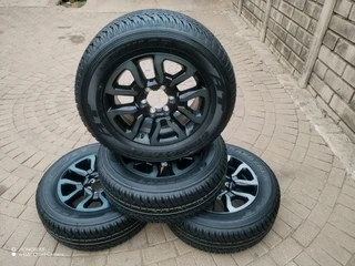 18Inch TOYOTA HILLUX Magrims 6Holes &amp; DUNLOP GRAND TREK Tyres 265 60R18 A Set Of Four On Sale.