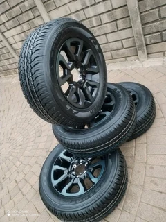 18Inch TOYOTA HILLUX Magrims 6Holes &amp; DUNLOP GRAND TREK Tyres 265 60R18 A Set Of Four On Sale.