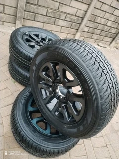 18inch Toyota Hillux Magrims 6holes & Dunlop Grand Trek Tyres 265 60r18 A Set Of Four On Sale.