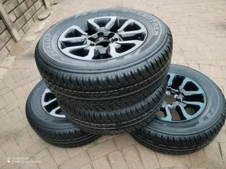18Inch TOYOTA HILLUX Magrims 6Holes &amp; DUNLOP GRAND TREK Tyres 265 60R18 A Set Of Four On Sale.