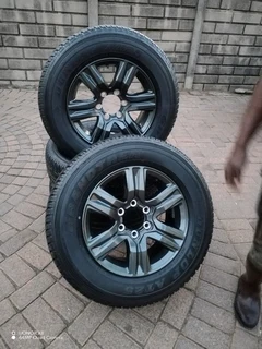 17inch Toyota Fortuna Magrims 6holes & Dunlop Grand Trek Tyres 255 65r17 A Set Of Four On Sale.