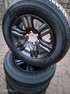 17Inch TOYOTA FORTUNA Magrims 6Holes &amp; DUNLOP GRAND TREK Tyres 255 65R17 A Set of Four On Sale.