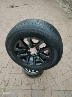 One Fairy Used Dunlop Grand Trek Tyre 265 60r18 & 18inch Toyota Hillux Magrim On Sale.