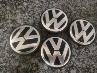 VW AMAROK Wheel Centre Caps A set of four on sale.
