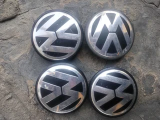 VW AMAROK Wheel Centre Caps A set of four on sale.