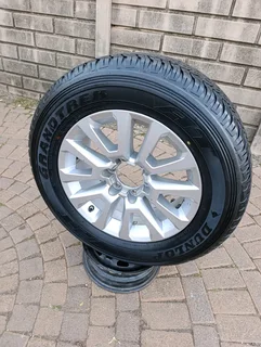 One 18inch Toyota Hillux Magrim & Dunlop Grand Trek Tyre 265 60r18 On Sale.