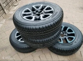 18Inch TOYOTA HILLUX Magrims 6Holes &amp; DUNLOP GRAND TREK Tyres 265 60R18 A Set of four on sale.