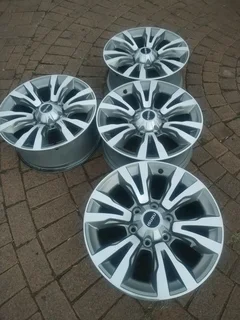18Inch 6Holes ISUZU Xrider Magrims A Set of four on sale.