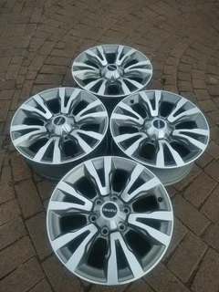 18Inch 6Holes ISUZU Xrider Magrims A Set of four on sale.