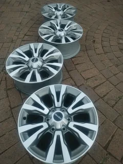 18Inch 6Holes ISUZU Xrider Magrims A Set of four on sale.
