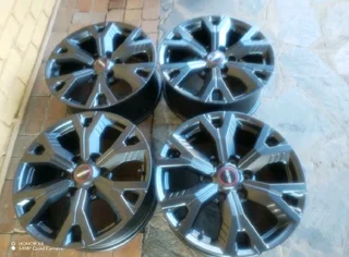 6Holes 18Inch ISUZU DMAX Magrims Black A Set of four on sale.