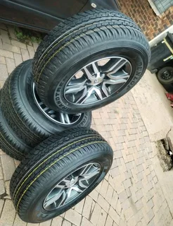 17Inch TOYOTA FORTUNA Magrims 6Holes &amp; DUNLOP GRAND TREK Tyres 265/65R17 A Set of four on sale.
