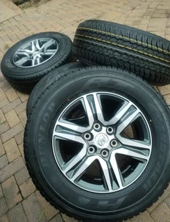 17Inch TOYOTA FORTUNA Magrims 6Holes &amp; DUNLOP GRAND TREK Tyres 265/65R17 A Set of four on sale.