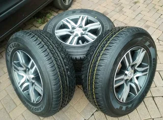 17Inch TOYOTA FORTUNA Magrims 6Holes &amp; DUNLOP GRAND TREK Tyres 265/65R17 A Set of four on sale.