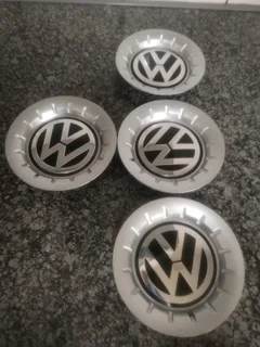 Polo Volkswagen Wheel Centre Caps A Set Of Four On Sale.