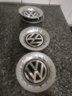 POLO VOLKSWAGEN Wheel Centre Caps A Set of four on sale.