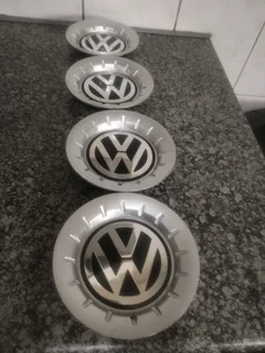 POLO VOLKSWAGEN Wheel Centre Caps A Set of four on sale.