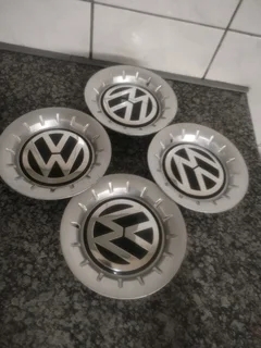 POLO VOLKSWAGEN Wheel Centre Caps A Set of four on sale.