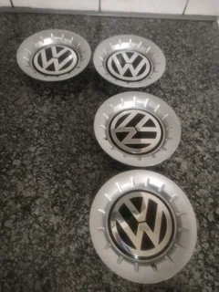 POLO VOLKSWAGEN Wheel Centre Caps A Set of four on sale.