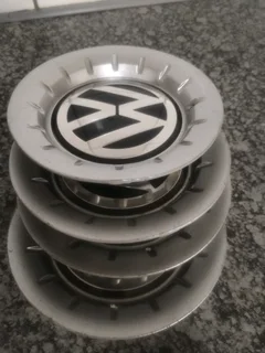 POLO VOLKSWAGEN Wheel Centre Caps A Set of four on sale.