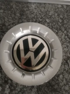 POLO VOLKSWAGEN Wheel Centre Caps A Set of four on sale.