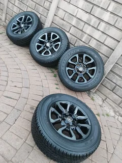 18Inch TOYOTA HILLUX Magrims 6Holes &amp; DUNLOP GRAND TREK Tyres 265 60R18 A Set of Four On Sale.