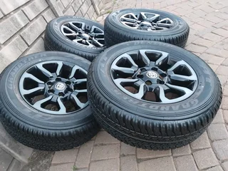 18Inch TOYOTA HILLUX Magrims 6Holes &amp; DUNLOP GRAND TREK Tyres 265 60R18 A Set of Four On Sale.