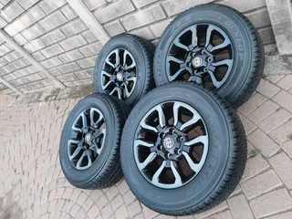 18Inch TOYOTA HILLUX Magrims 6Holes &amp; DUNLOP GRAND TREK Tyres 265 60R18 A Set of Four On Sale.