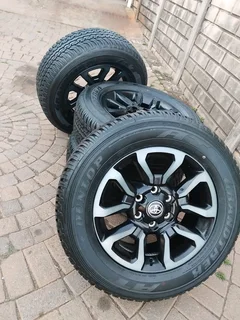 18Inch TOYOTA HILLUX Magrims 6Holes &amp; DUNLOP GRAND TREK Tyres 265 60R18 A Set of Four On Sale.