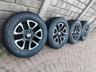 265 60r18 Dunlop Grand Trek Tyres & 18inch Toyota Hillux Magrims 6holes A Set Of Four On Sale.