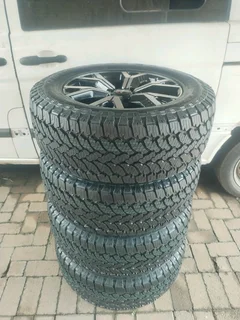18inch Isuzu Dmax Magrims 6holes & General Grabber At 3 Tyres 265 60r18 A Set Of Four On Sale.