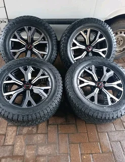 18inch Isuzu Dmax Magrims 6holes & General Grabber At 3 Tyres A Set Of Four On Sale.