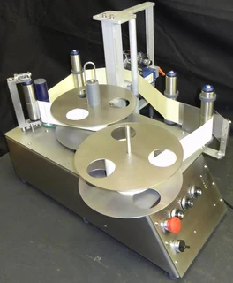 LABELING, FILLING AND DATE CODING EQUIPMENT