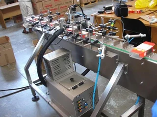 LABELING, FILLING AND DATE CODING EQUIPMENT
