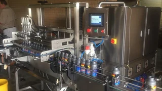 LABELING, FILLING AND DATE CODING EQUIPMENT